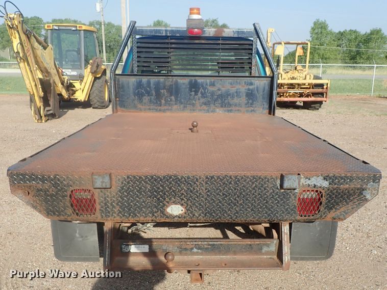 image for item DG2312 2002 Ford F250 Super Duty  SuperCab flatbed pickup truck