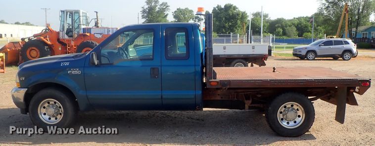 image for item DG2312 2002 Ford F250 Super Duty  SuperCab flatbed pickup truck
