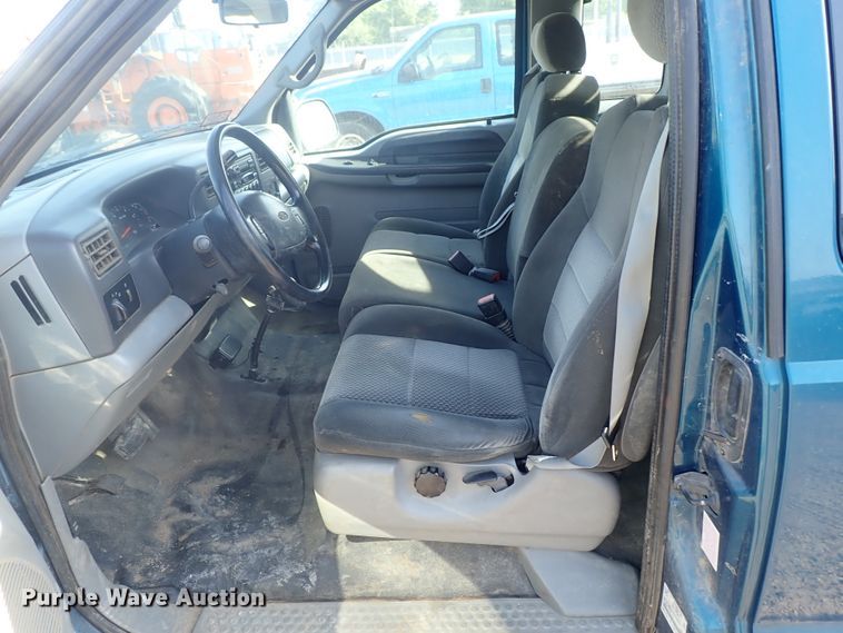 image for item DG2312 2002 Ford F250 Super Duty  SuperCab flatbed pickup truck