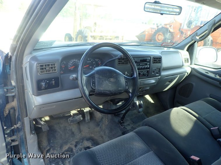 image for item DG2312 2002 Ford F250 Super Duty  SuperCab flatbed pickup truck