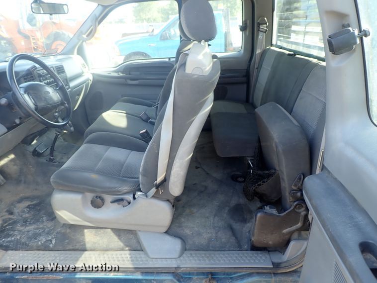 image for item DG2312 2002 Ford F250 Super Duty  SuperCab flatbed pickup truck