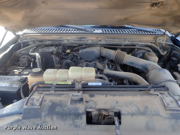 image for item DG2312 2002 Ford F250 Super Duty  SuperCab flatbed pickup truck