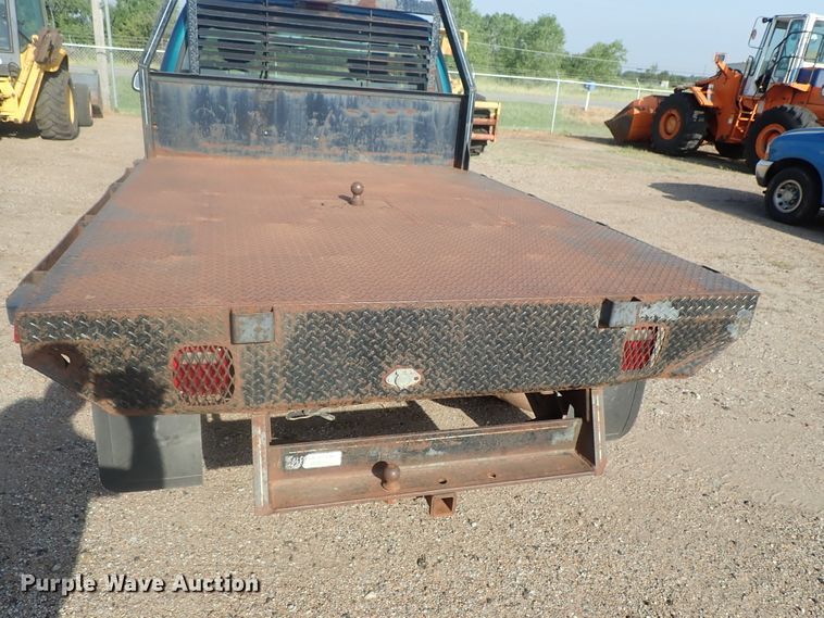 image for item DG2312 2002 Ford F250 Super Duty  SuperCab flatbed pickup truck
