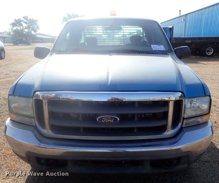 image for item DG2314 2004 Ford F250 Super Duty  SuperCab flatbed pickup truck