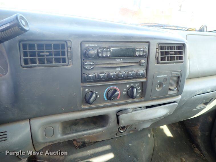 image for item DG2314 2004 Ford F250 Super Duty  SuperCab flatbed pickup truck