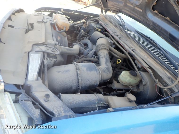 image for item DG2314 2004 Ford F250 Super Duty  SuperCab flatbed pickup truck