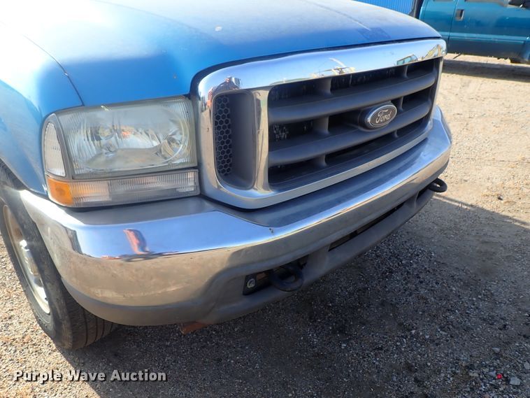 image for item DG2314 2004 Ford F250 Super Duty  SuperCab flatbed pickup truck