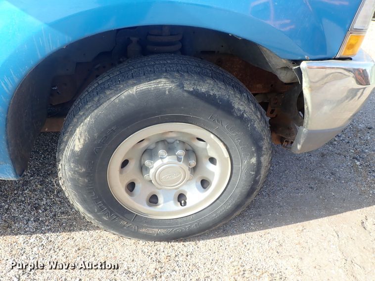 image for item DG2314 2004 Ford F250 Super Duty  SuperCab flatbed pickup truck