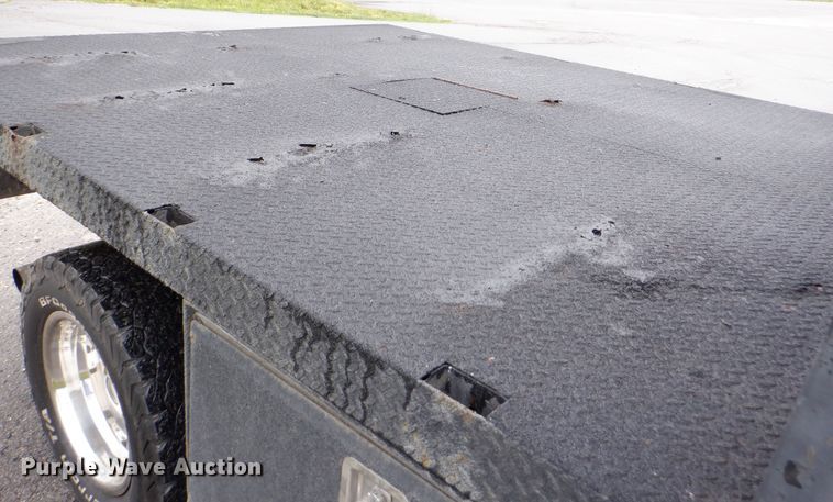 image for item DH1060 2006 Ford F350 Super Duty XL  SuperCab flatbed pickup truck