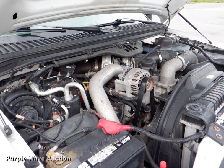 image for item DH1060 2006 Ford F350 Super Duty XL  SuperCab flatbed pickup truck