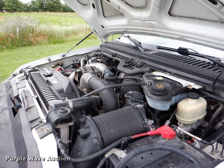 image for item DH1060 2006 Ford F350 Super Duty XL  SuperCab flatbed pickup truck