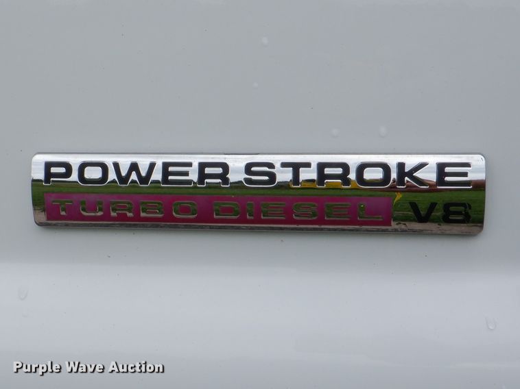 image for item DH1060 2006 Ford F350 Super Duty XL  SuperCab flatbed pickup truck