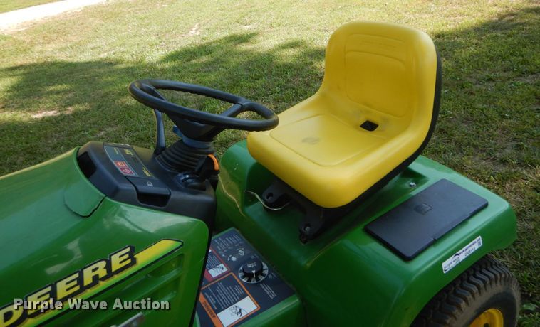 image for item GV9114 John Deere 335 lawn mower