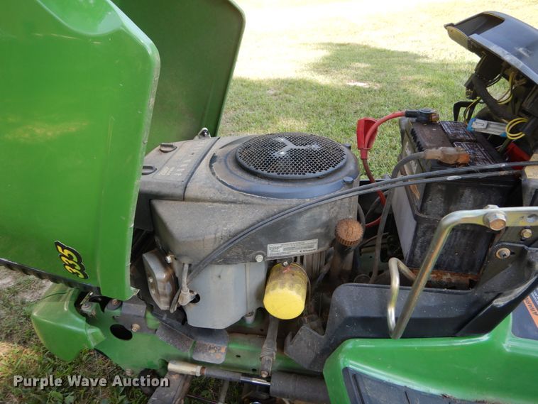 image for item GV9114 John Deere 335 lawn mower