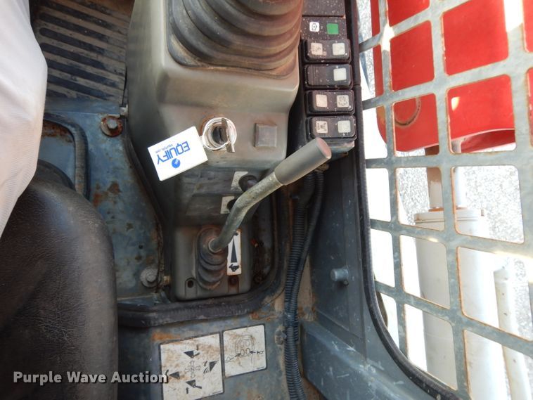 image for item DG6822 2014 Takeuchi TL12  skid steer loader