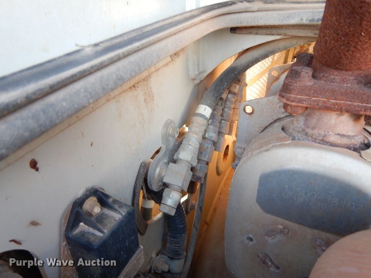 image for item DG6822 2014 Takeuchi TL12  skid steer loader