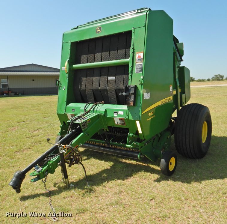 image for item DG1432 2015 John Deere 569 Mega Wide Plus  round baler