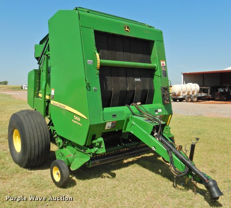 image for item DG1432 2015 John Deere 569 Mega Wide Plus  round baler
