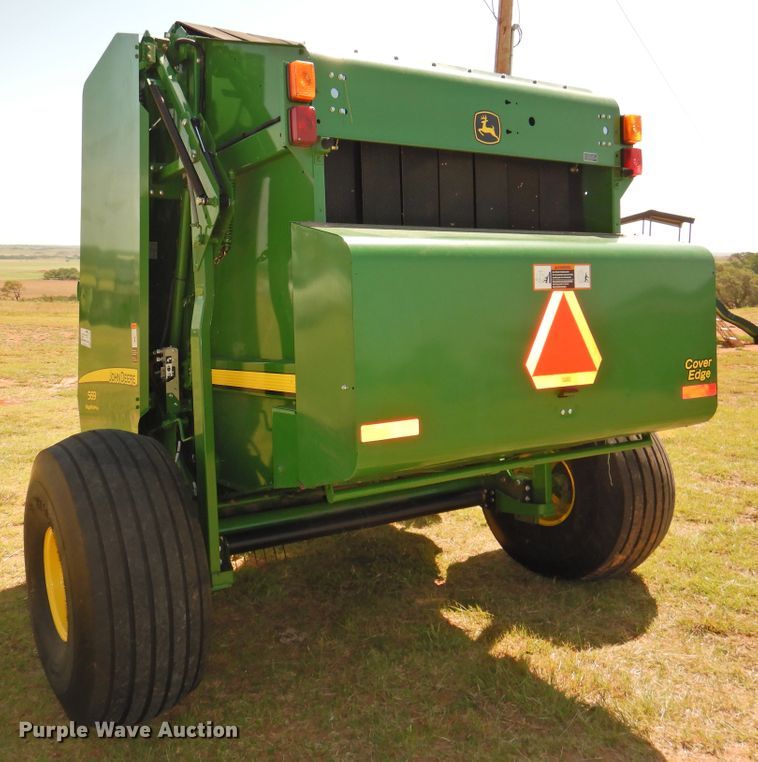 image for item DG1432 2015 John Deere 569 Mega Wide Plus  round baler