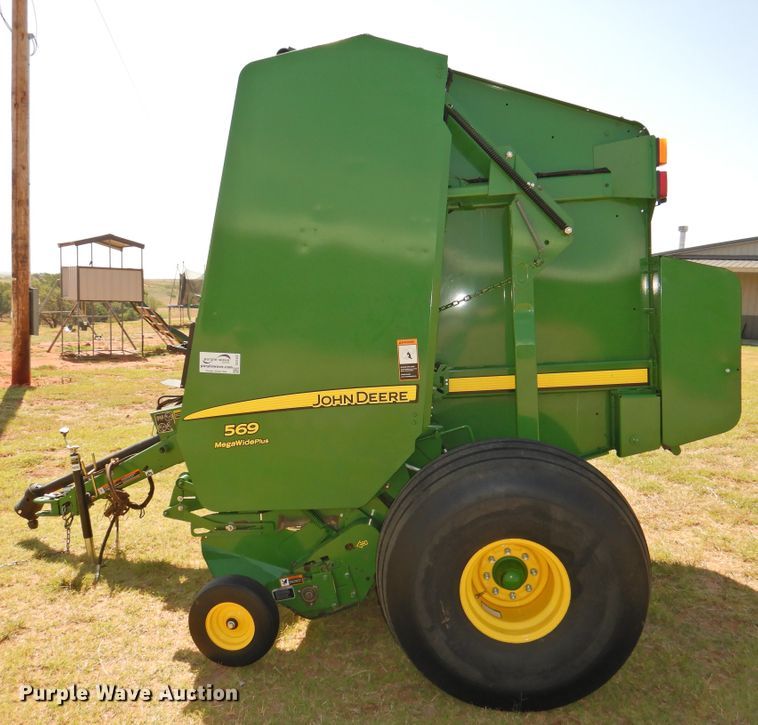 image for item DG1432 2015 John Deere 569 Mega Wide Plus  round baler