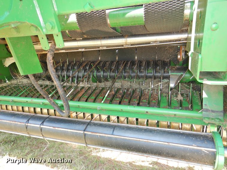 image for item DG1432 2015 John Deere 569 Mega Wide Plus  round baler