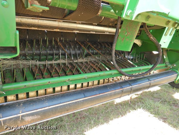 image for item DG1432 2015 John Deere 569 Mega Wide Plus  round baler