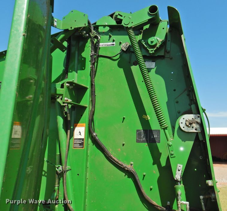image for item DG1432 2015 John Deere 569 Mega Wide Plus  round baler