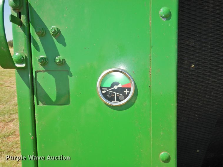 image for item DG1432 2015 John Deere 569 Mega Wide Plus  round baler