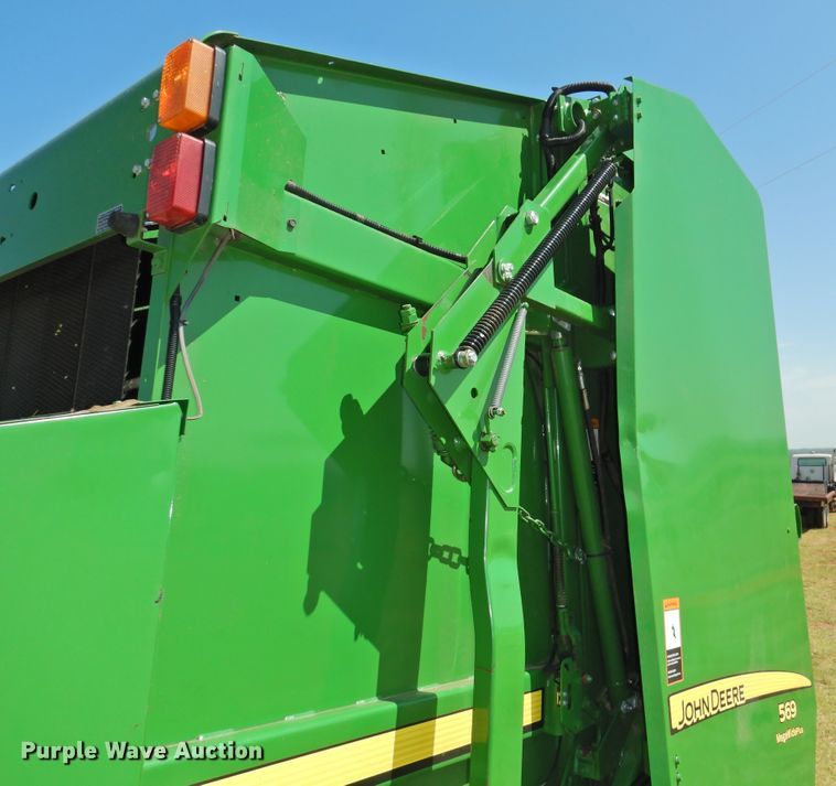 image for item DG1432 2015 John Deere 569 Mega Wide Plus  round baler