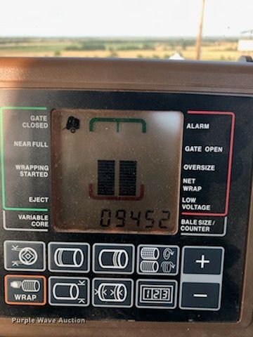 image for item DG1432 2015 John Deere 569 Mega Wide Plus  round baler