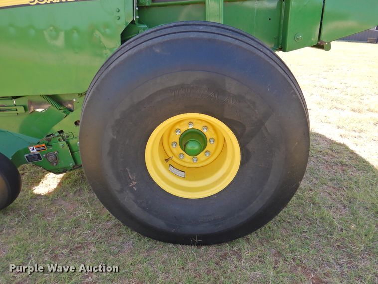 image for item DG1432 2015 John Deere 569 Mega Wide Plus  round baler