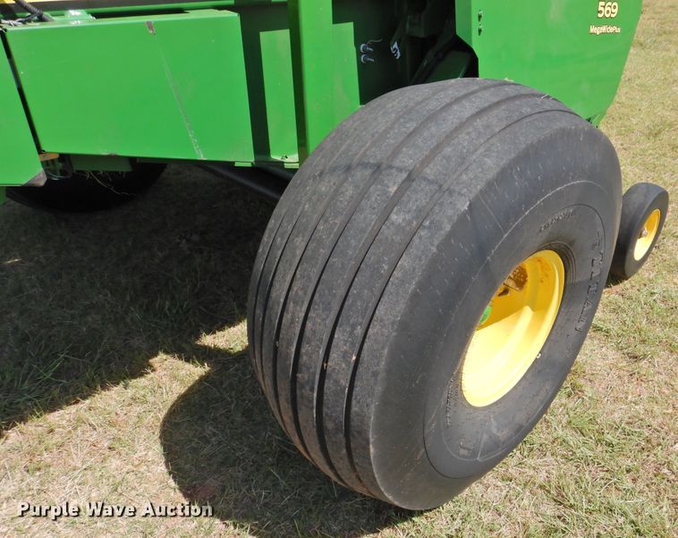 image for item DG1432 2015 John Deere 569 Mega Wide Plus  round baler