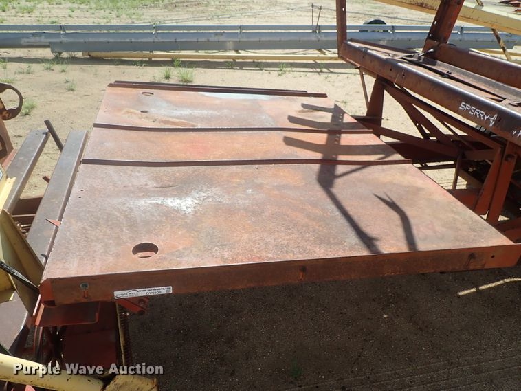 image for item GV9509 New Holland Stackliner 1002 bale stacker