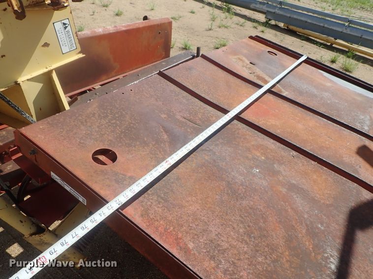 image for item GV9509 New Holland Stackliner 1002 bale stacker