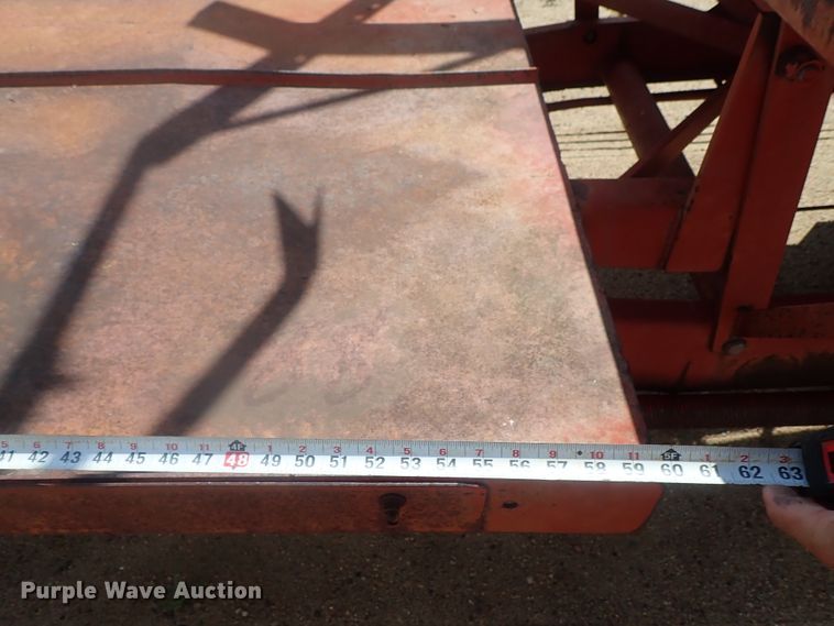 image for item GV9509 New Holland Stackliner 1002 bale stacker