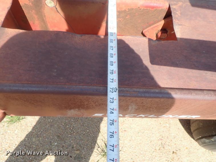 image for item GV9509 New Holland Stackliner 1002 bale stacker