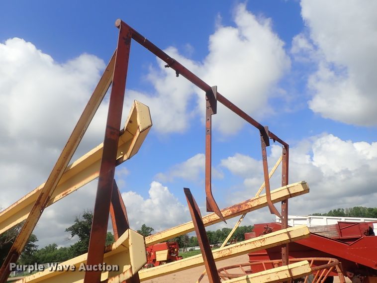 image for item GV9509 New Holland Stackliner 1002 bale stacker