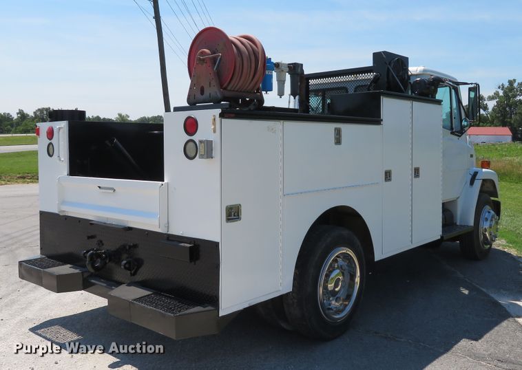 image for item DH1053 2004 Freightliner FL70  utility truck