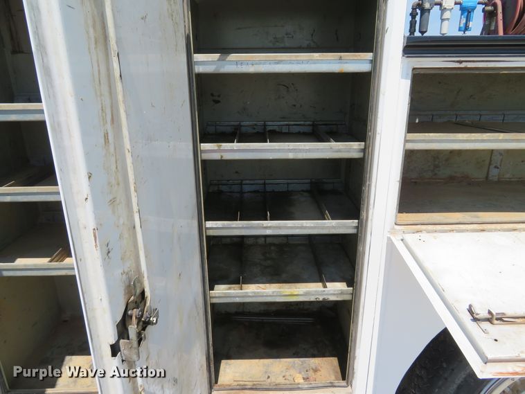 image for item DH1053 2004 Freightliner FL70  utility truck