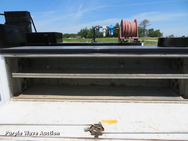 image for item DH1053 2004 Freightliner FL70  utility truck