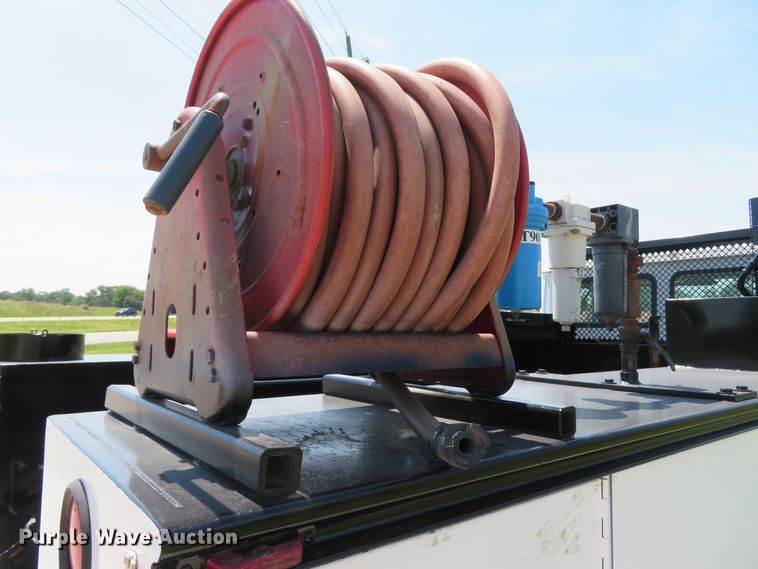 image for item DH1053 2004 Freightliner FL70  utility truck