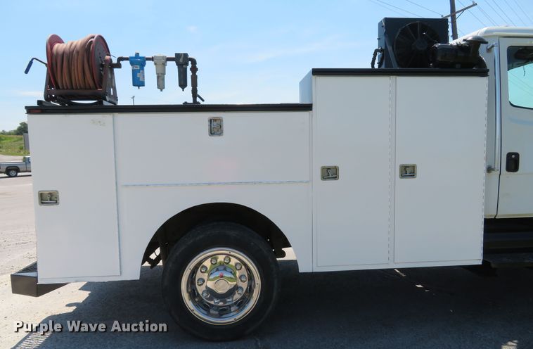 image for item DH1053 2004 Freightliner FL70  utility truck