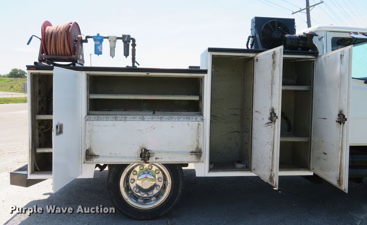 image for item DH1053 2004 Freightliner FL70  utility truck