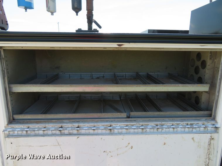 image for item DH1053 2004 Freightliner FL70  utility truck