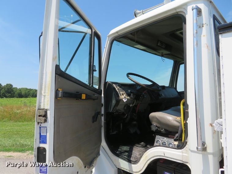 image for item DH1053 2004 Freightliner FL70  utility truck