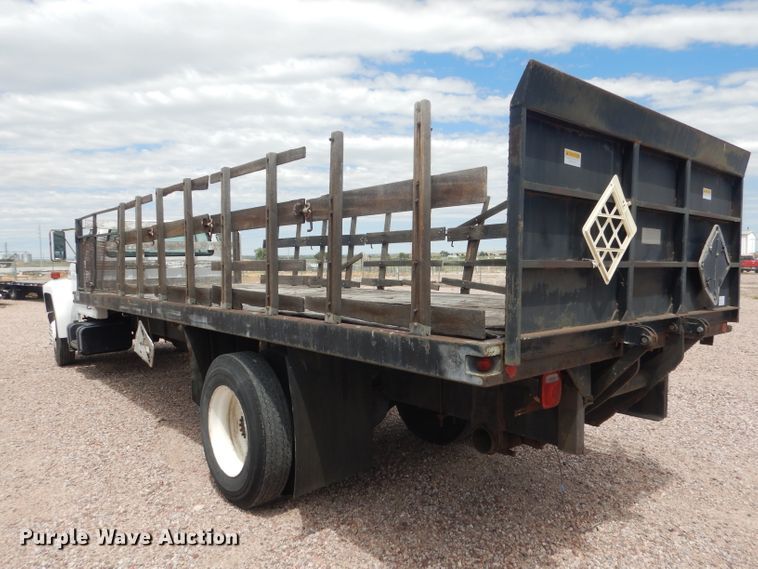 image for item FA9365 1993 Ford F700  flatbed truck