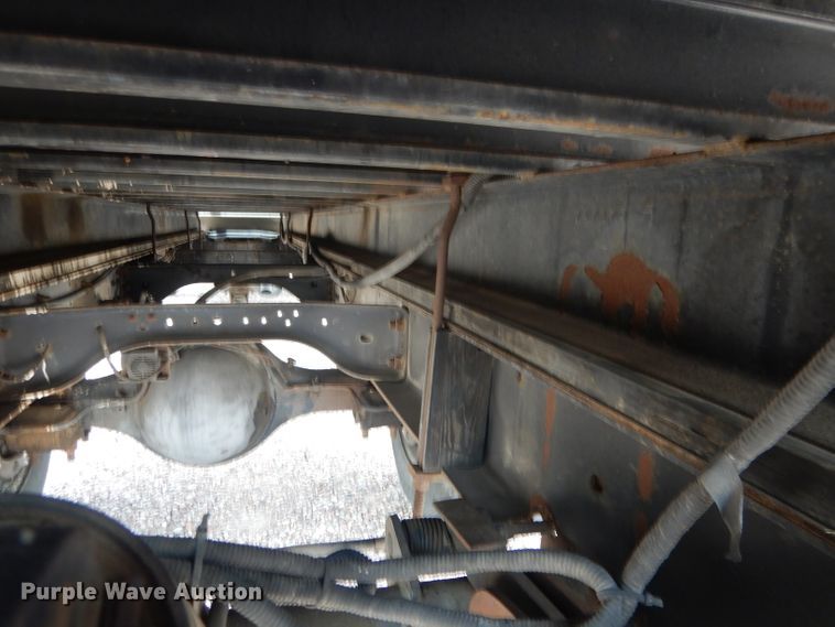 image for item FA9365 1993 Ford F700  flatbed truck