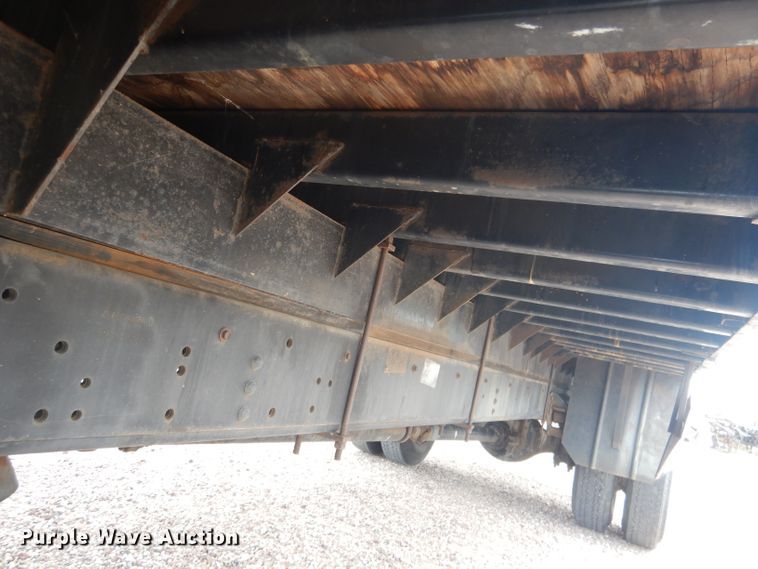 image for item FA9365 1993 Ford F700  flatbed truck