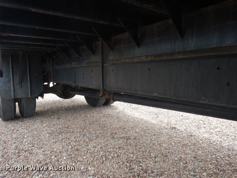 image for item FA9365 1993 Ford F700  flatbed truck