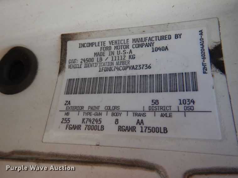 image for item FA9365 1993 Ford F700  flatbed truck